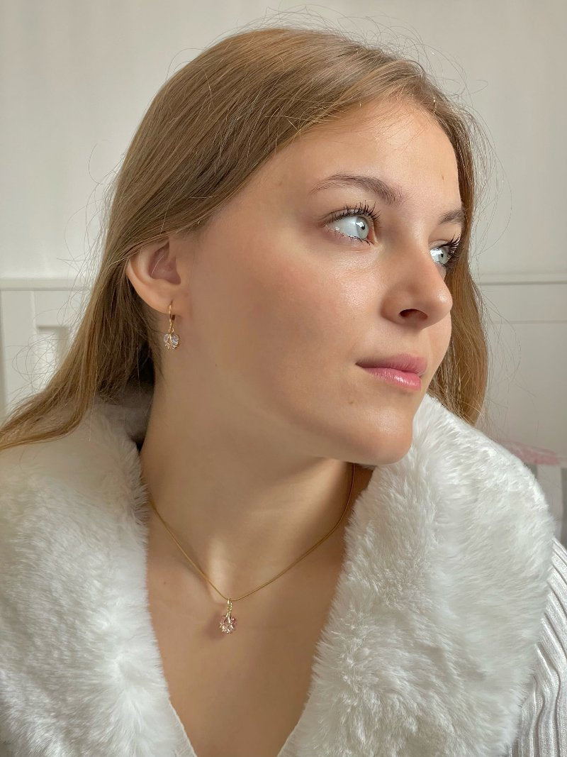 boucle d'oreille et collier coeur palais de diamant