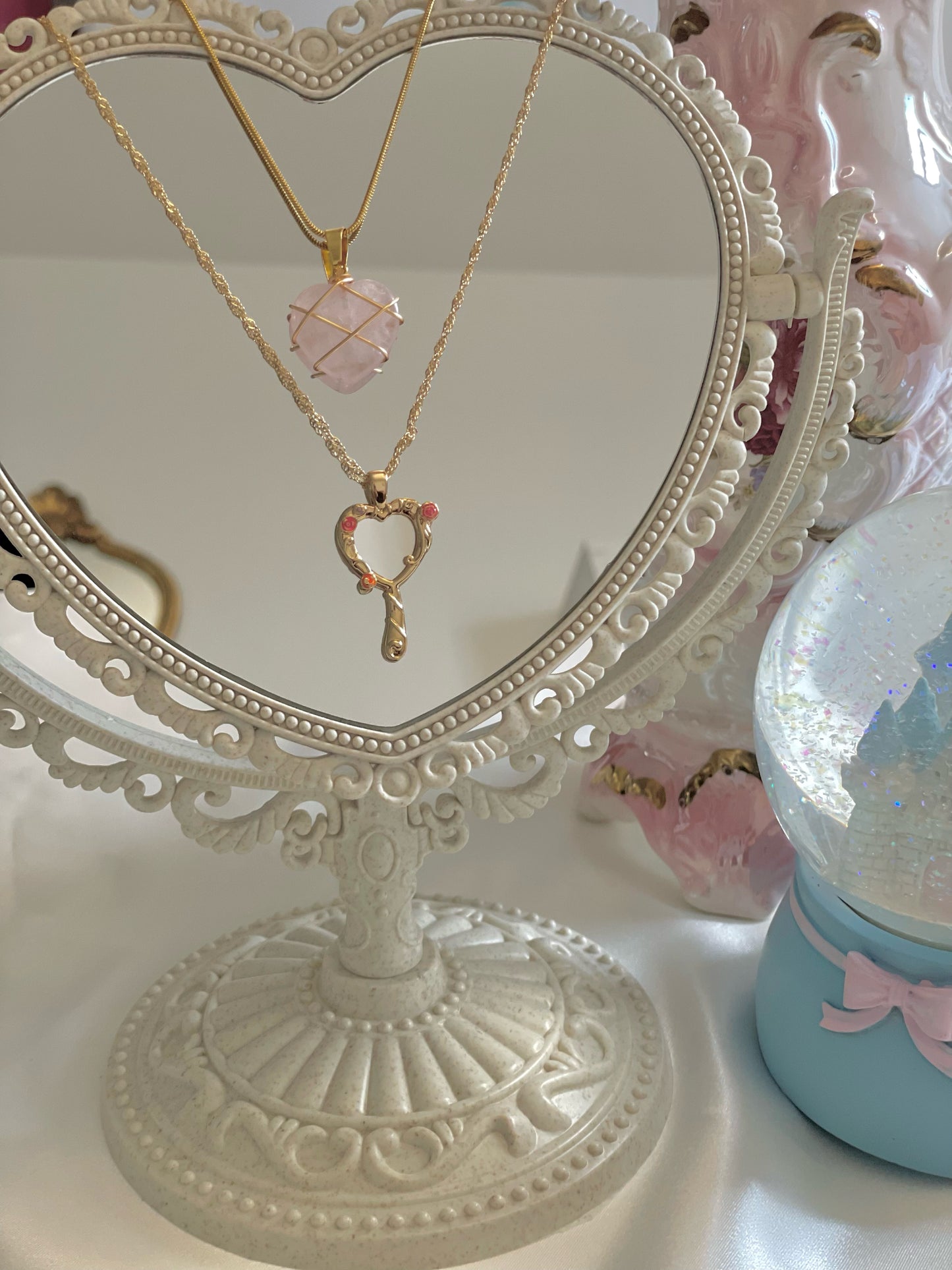 collier coeur de diamant et miroir